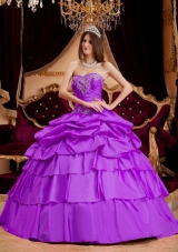 Purple Ball Gown Sweetheart Quinceanera Dress  with Ruffled Layers and Appliques